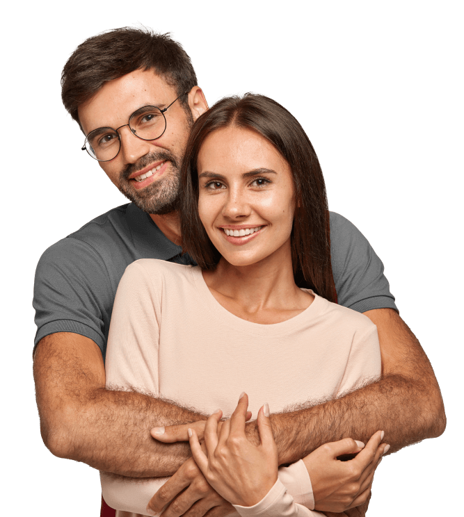 Happy couple hugging and smiling